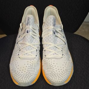 New Balance White and Gray Patterned Sneakers with Orange Accents